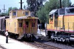 Union Pacific local conductor "rolls by" UP #73 west at the old Riverside Jct..